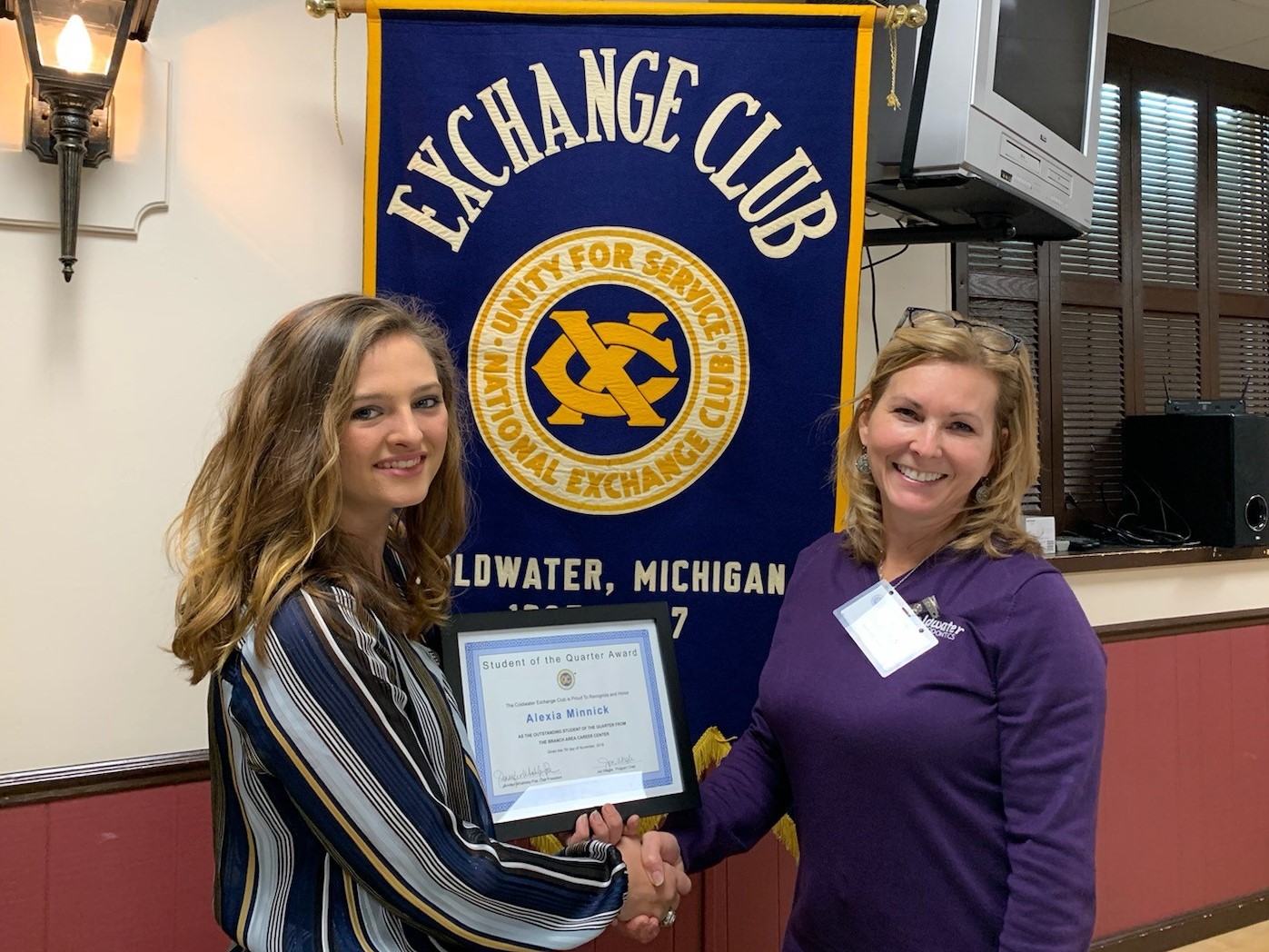 Alexia and Exchange Club member Jennifer Poe