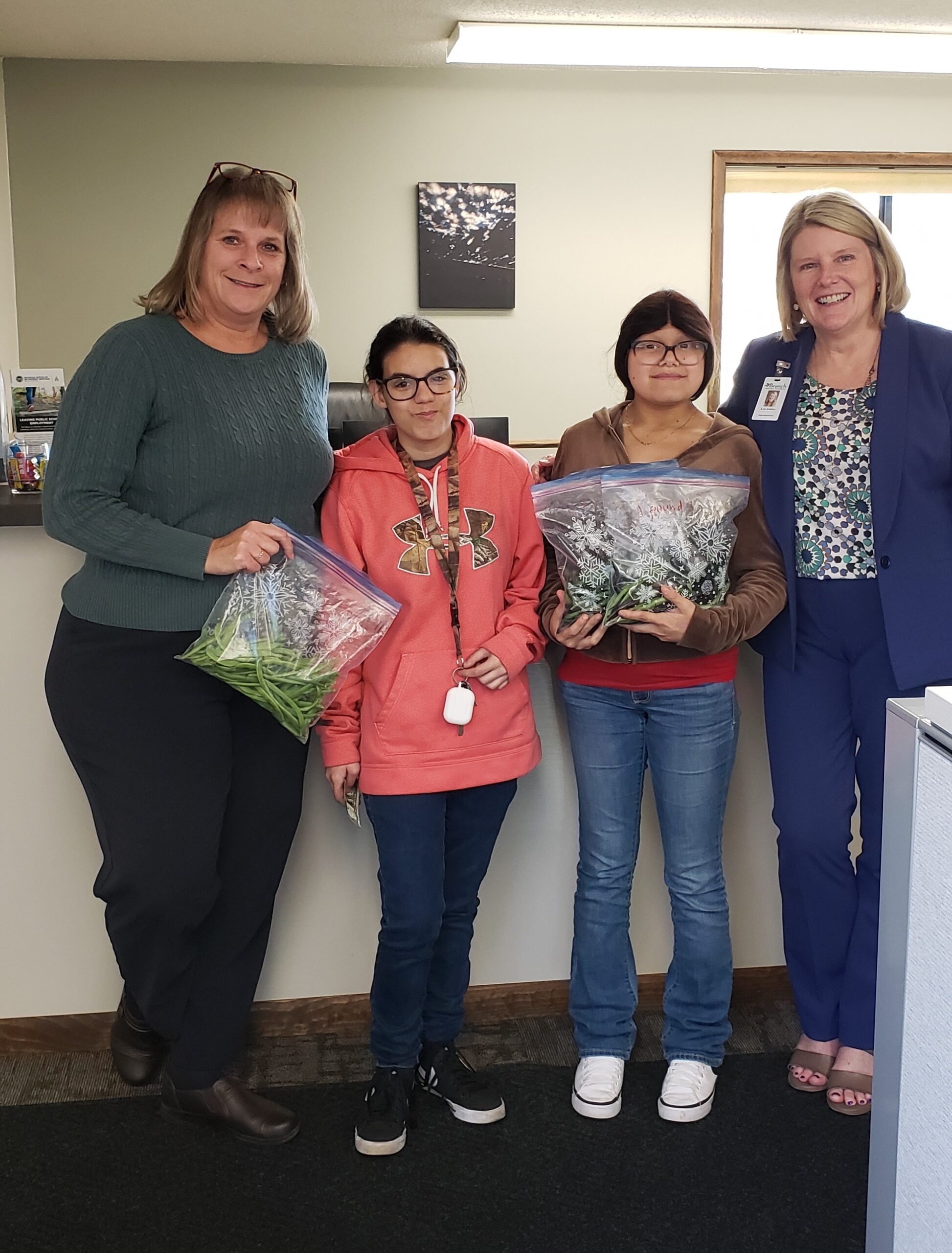 STEPS students delivering beans they grew