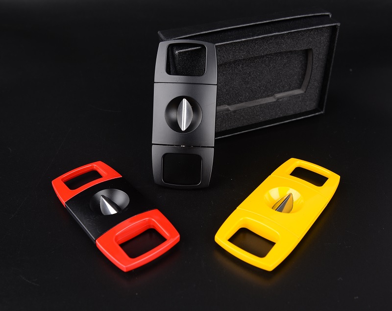 premium V-shaped cigar cutter, designed for cigar enthusiasts, luxury cigar brands, and promotional gift programs. Featuring a sharp V-cut blade design, this cutter creates a precise wedge-shaped cut to enhance airflow and deliver a smooth smoking experience while maintaining the integrity of the cigar cap.