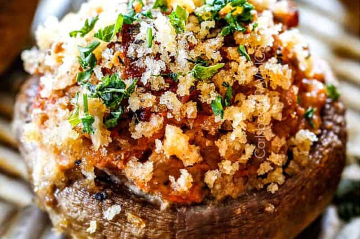 Appetizers: Stuffed mushrooms topped with parmesan cheese and parsley, perfect for Italian cuisine fans.