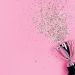 bright pink background with silver glitter spilling out of a silver trophy, what is a writing contest?