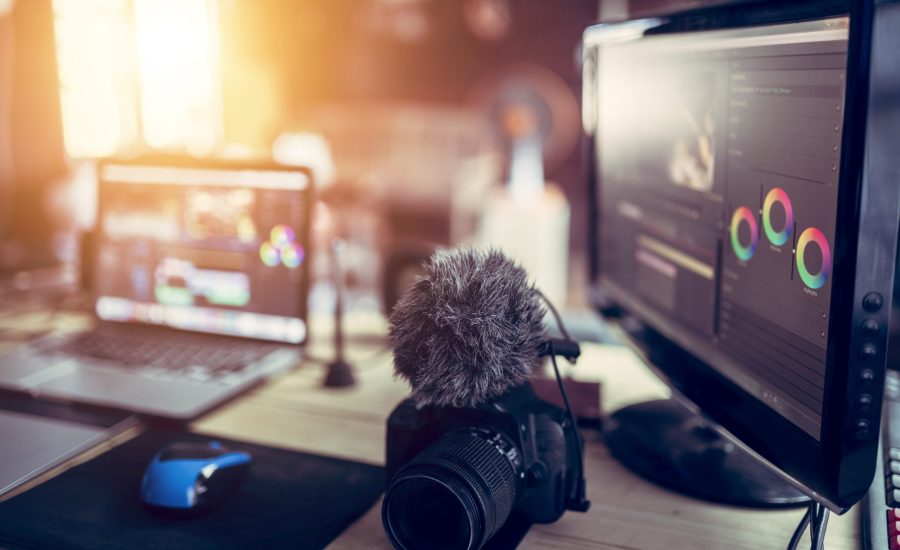 Freelance desk and laptop for editing footage is job for content