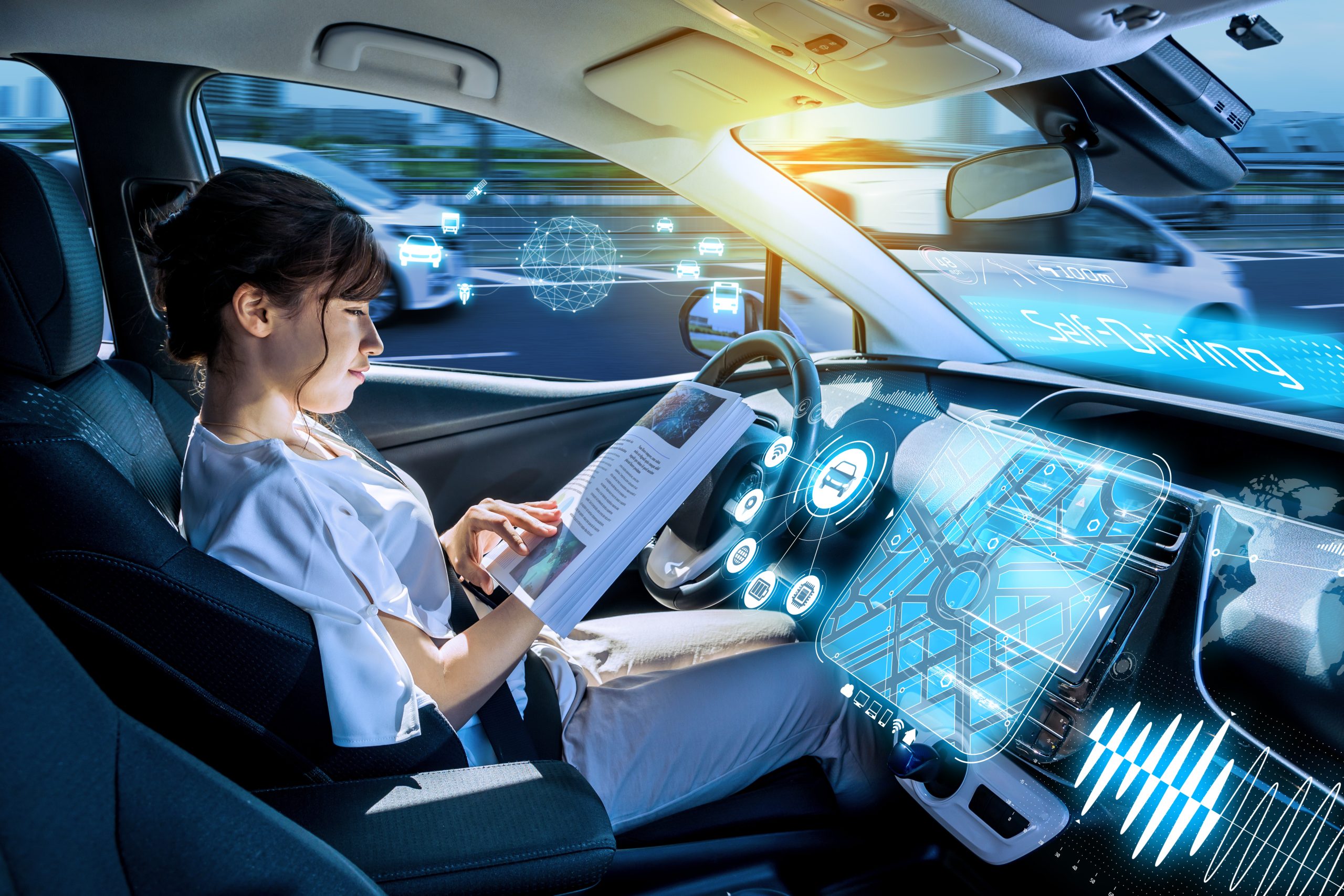 young woman using a smart phone in a autonomous car. self driving