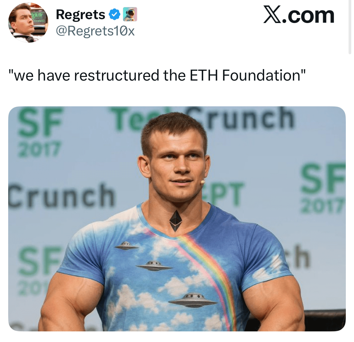 Funny tweet meme showing a muscular man in a rainbow UFO shirt with a serious caption about restructuring the Ethereum Foundation, taken at TechCrunch SF 2017.