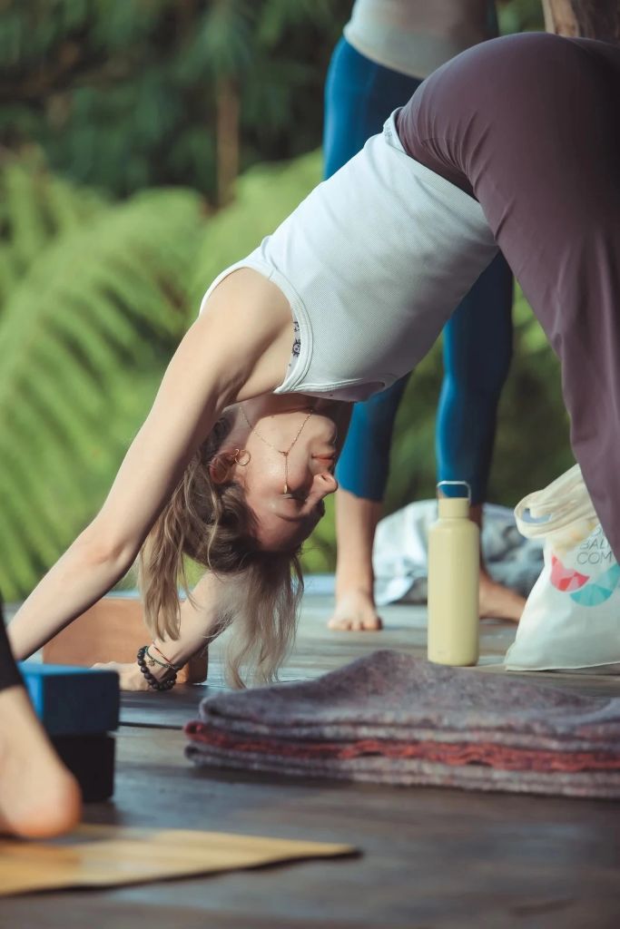 YogaBali student in downward dog pose during a Bali 200 hour yoga teacher training.
