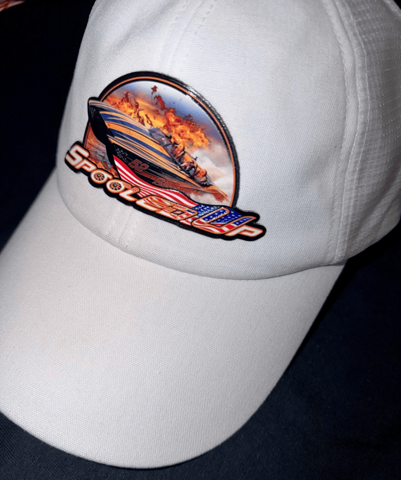 Speedboat patch on a white cap