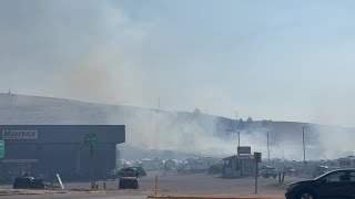 Crews battle wildfire along I-90 in Missoula