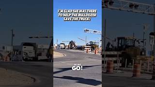 Bulldozer moved the semi truck with a lowboy trailer, which stuck on a railroad tracks. #trucking