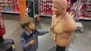 Noah fights a rubber guy nipple twist