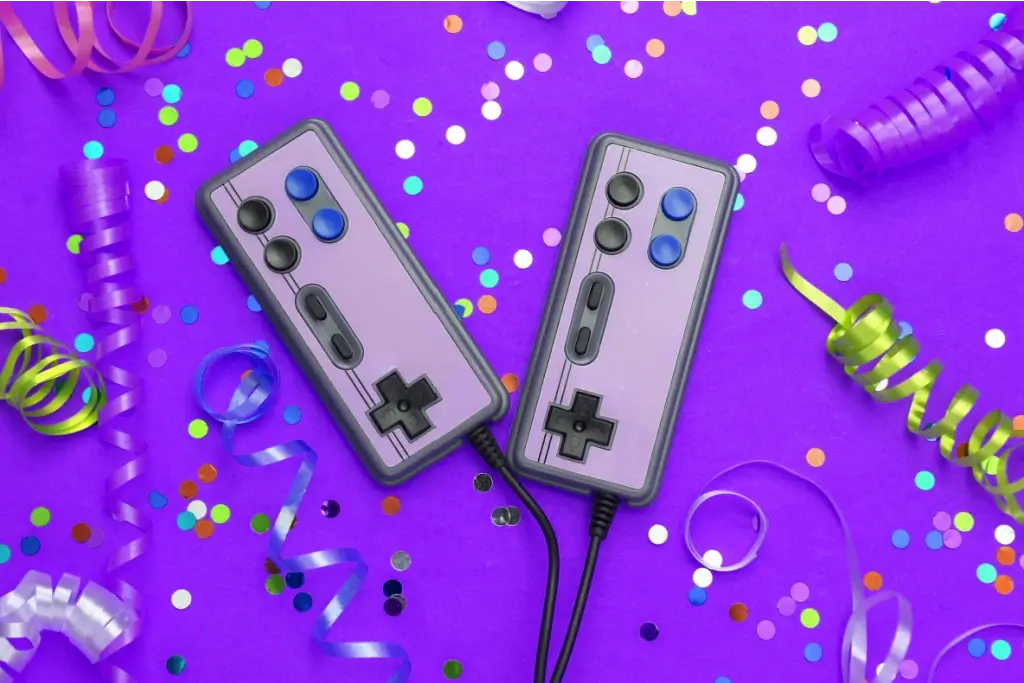 Classic SNES controllers for a cosmic pixel party against a purple background with confetti.