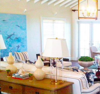 "Sharks" mural installed on left wall at Highbourne Cay.