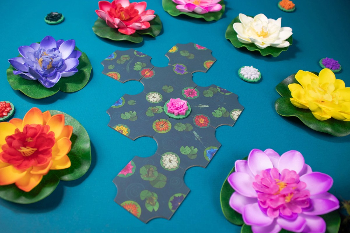 a gentle rain game overhead view of tiles and lily flower props