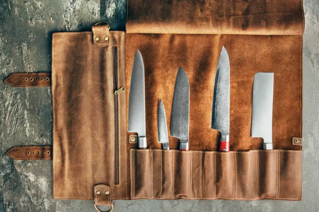 A knife set in a leather pouch.