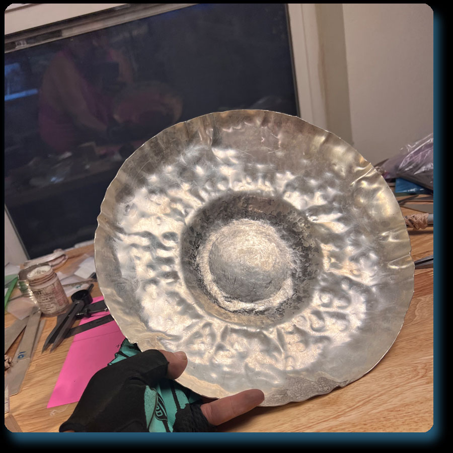 Using old raising techniques to create pot like silver vessals