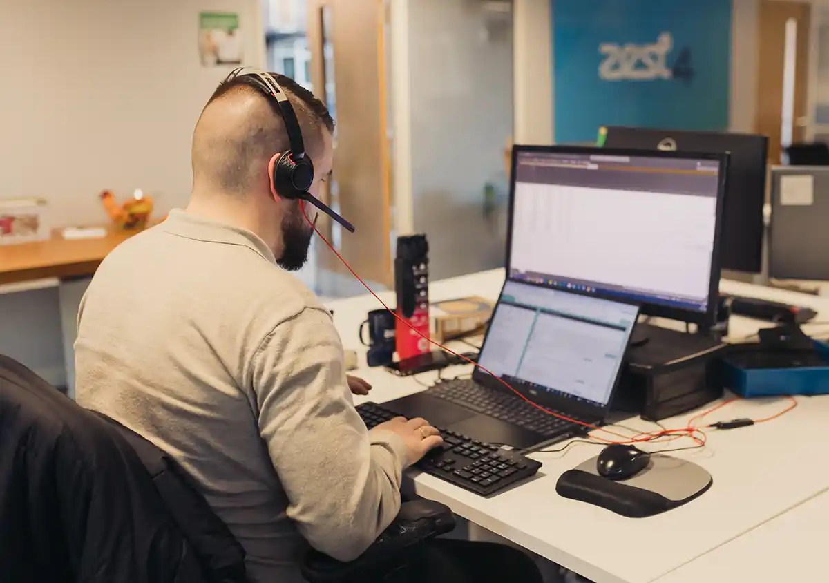 Zest4 customer support worker talking on the telephone