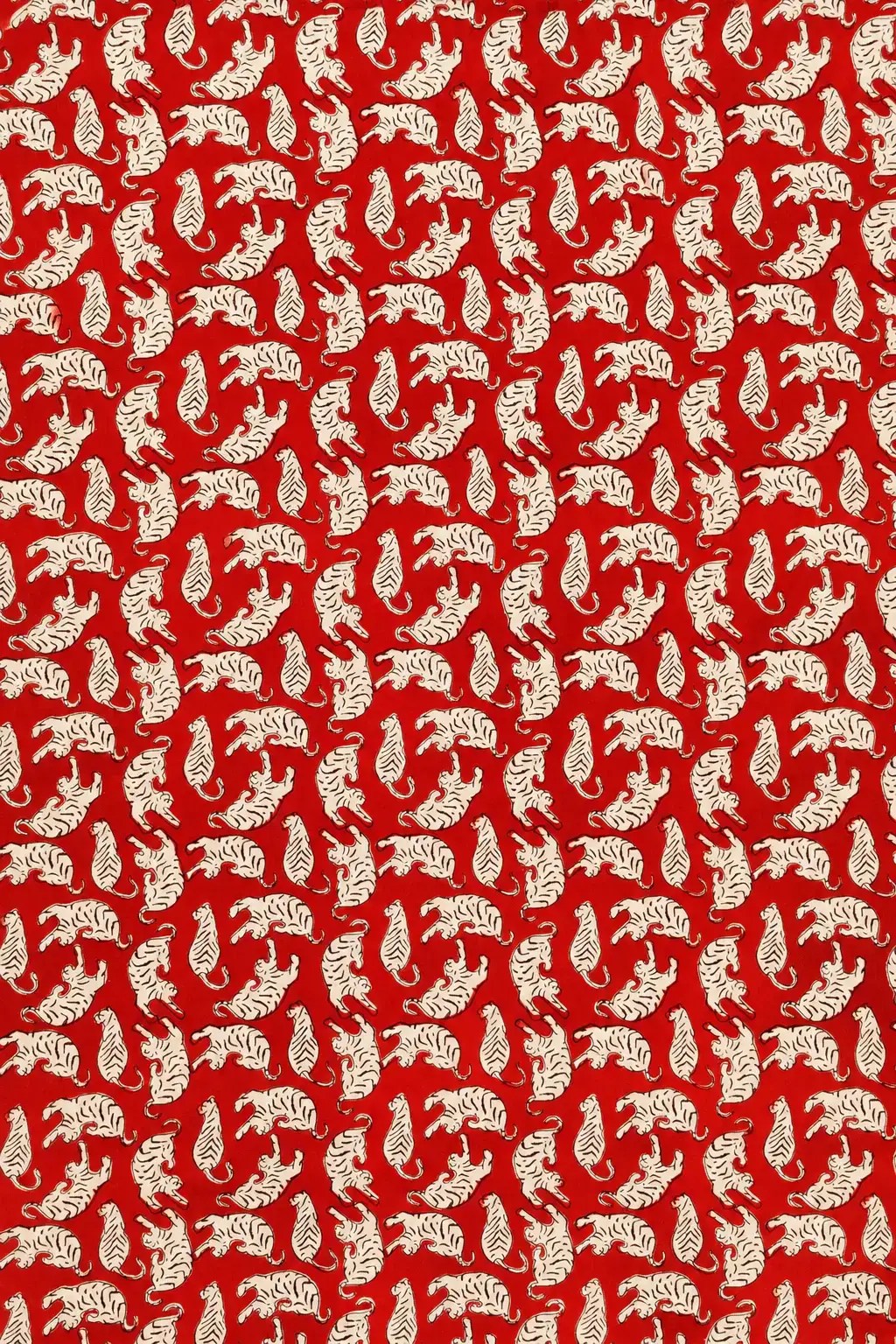 Red Animal Motif Fabric with Cream Traditional Pattern