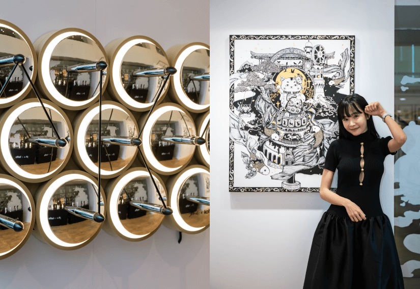 民眾在藝術展覽現場參觀極具現代感的大型立體裝置作品