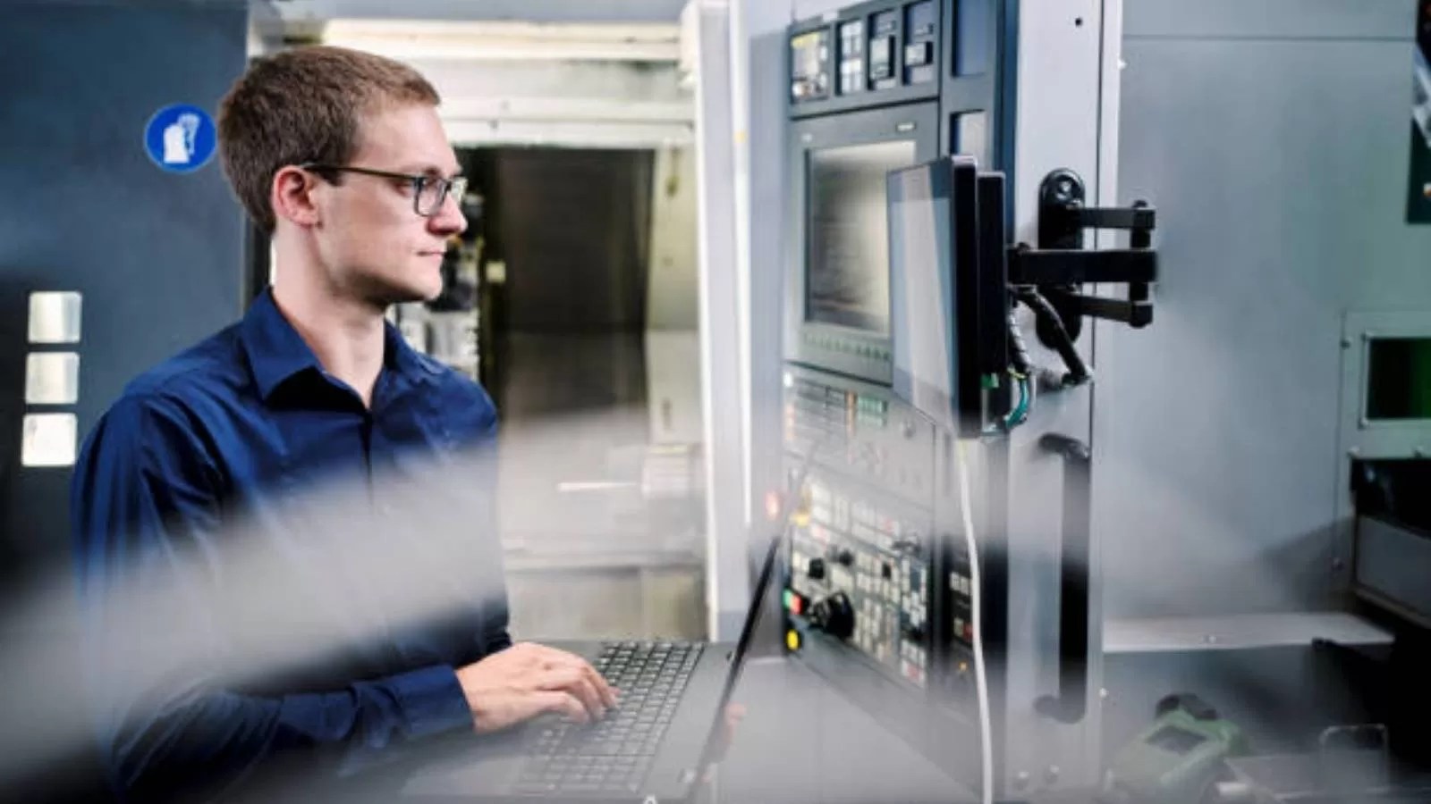 The CNC machine setup process involves preparing the workspace, securing the machine, connecting power, installing cutting tools, configuring machine parameters, setting up the workpiece, and running initial tests.